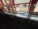 an image of a commercial kitchen with stainless steel counter tops