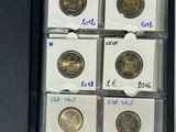 a box of coins that are sitting on a table