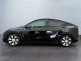 an image of a black car in a room