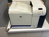 a printer that is sitting on a shelf in the bathroom