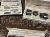 three different items in a case on a table