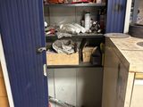 an image of a room that has a cabinet in it