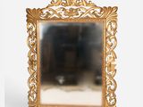 a mirror that is sitting on a table