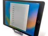 an image of a tablet computer sitting on top of a desk