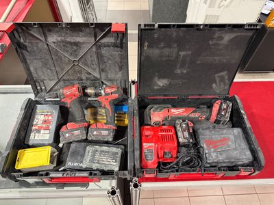 two tools that are in a case on the floor