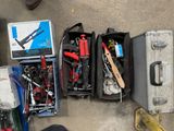 a lot of tools in a case on the floor