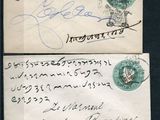 four pieces of paper with writing on them sitting on a table