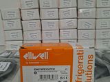 a box of wires on a table next to a bunch of boxes of wires