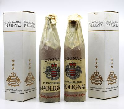 three bottles of wine sitting next to each other on a white surface