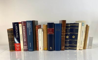 a lot of books that are sitting on a table