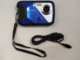 a small blue camera with a cord attached to it
