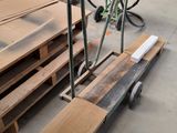 several pieces of wood are stacked on a pallet in a warehouse
