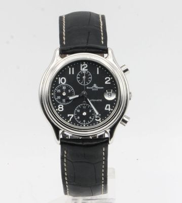 an image of a close up of a wrist watch on a white surface