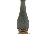 an image of a green vase with a gold base on a white background