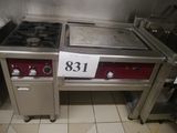 a picture of a commercial kitchen with two stoves and a dishwasher