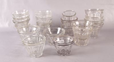 a lot of glasses that are sitting on a table