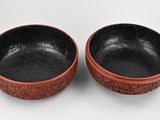 pair of chinese carved red lacroe bowls