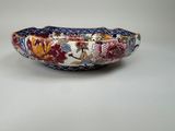 bowl with a floral design on the outside of the bowl