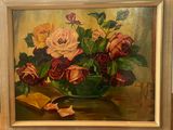 a painting of roses in a green bowl on a table