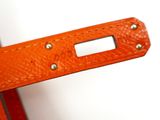 a close up of a piece of luggage on a white surface