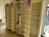 a store with a lot of shelves in the middle of the room