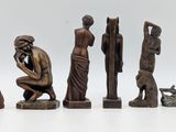 a group of figurines that are sitting on a table