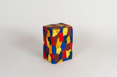 multicolored wooden cube on a white background
