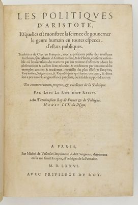 un livre ouvert sur une surface blanche avec un titre en noir et blanc