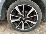 a close up of a tire on a car ' s rim
