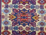 a large rug with a colorful design on it