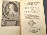 an old book with a picture of a man in a picture frame