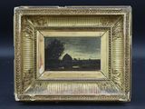 un tableau représentant un paysage, dans un cadre doré, sur fond noir