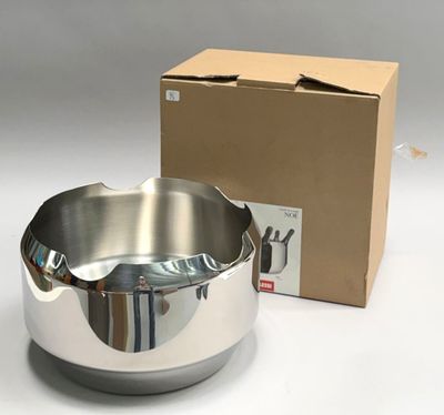 a stainless steel bowl and a cardboard box on the table