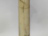 an image of a gold and white marble pedestal with a marble top