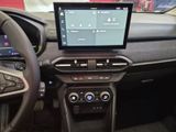 the interior of a car with a steering wheel, dashboard, and display screen