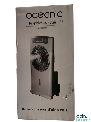 a box with a fan inside of it on a white surface