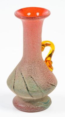 a vase with a handle on a white background