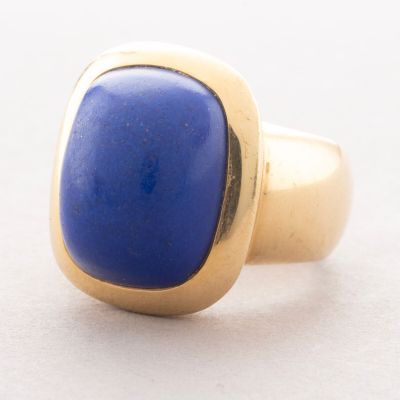 gold and lapis ring with a lapis stone in the center