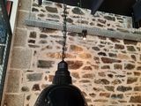 a black light hanging from the ceiling of a restaurant
