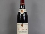 a bottle of wine that is sitting on a table