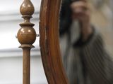 a man taking a picture of himself in the mirror