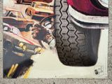 a picture of a skateboard with a picture of a car on it