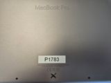 the back of a laptop computer with a sticker on it ' s side
