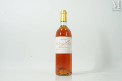 a bottle of wine that is sitting on a table