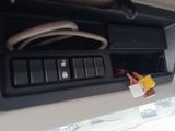 an image of a car dashboard with a remote control