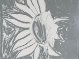 a black and white drawing of a sunflower on a piece of paper