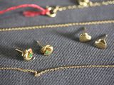 many different types of jewelry that are on the table