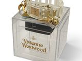 a clear box with a watch inside of it