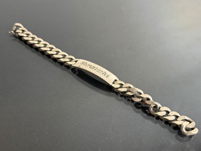 a close up of a bracelet on a table