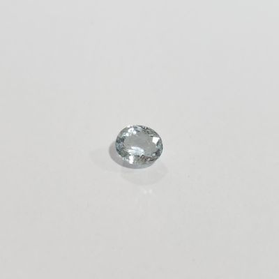 a blue topazte gems is shown on a white surface